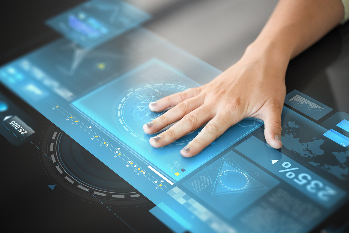 Hand Using Black Interactive Panel with Charts